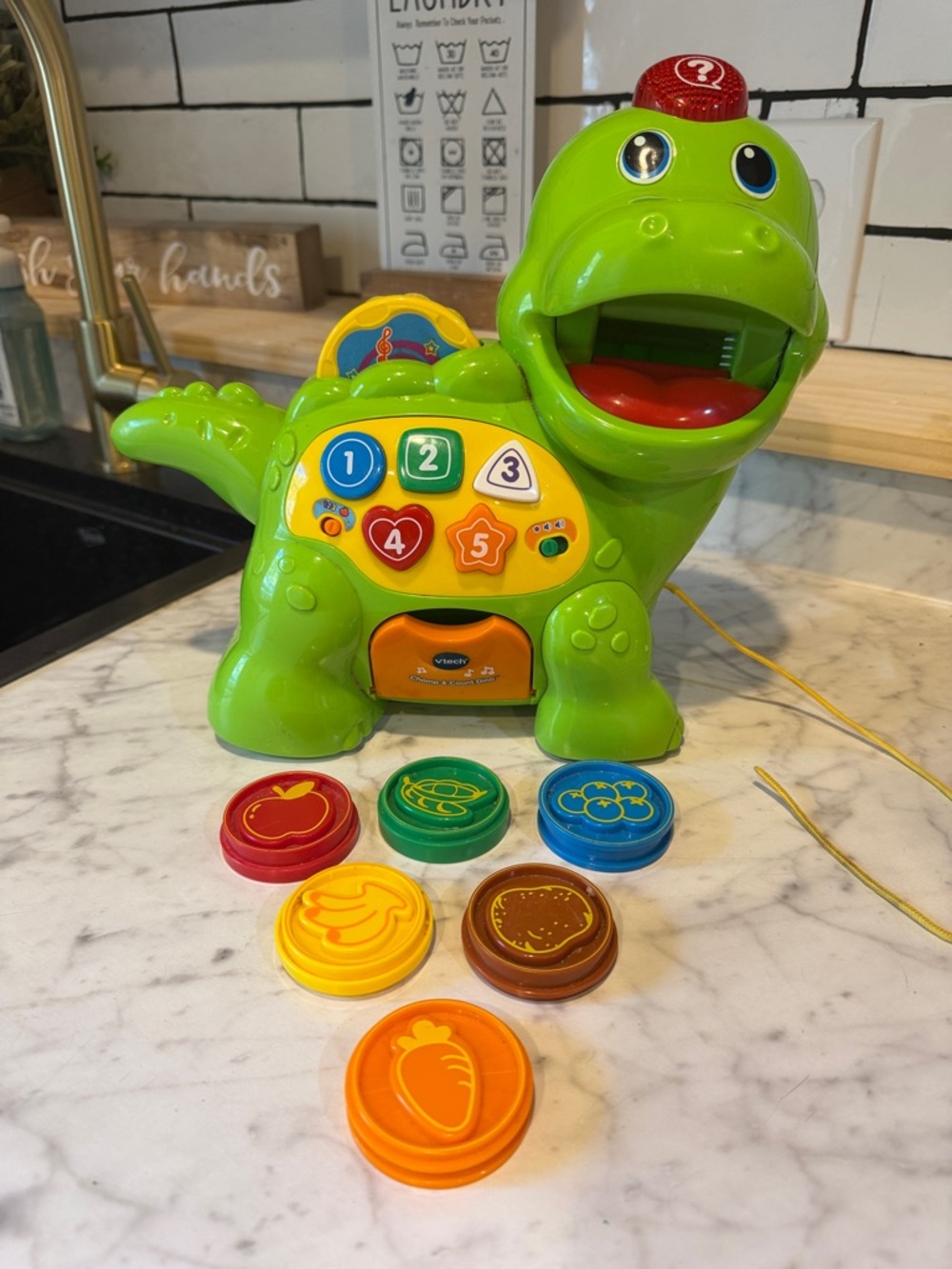 Green Dino Learning Toy with Number & Shape Discs